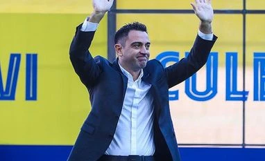 Barcelona fans welcome new coach Xavi Hernandez at the Camp Nou Xavi Hernandez