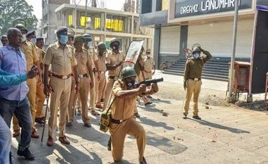 Police use teargas to disperse anti-CAA protesters in Karnataka's Mangaluru CAA