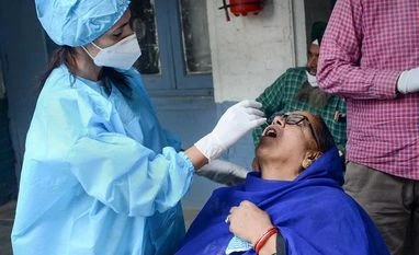 Passengers from 'at risk' countries to undergo RT-PCR test: Gujarat coronavirus, covid