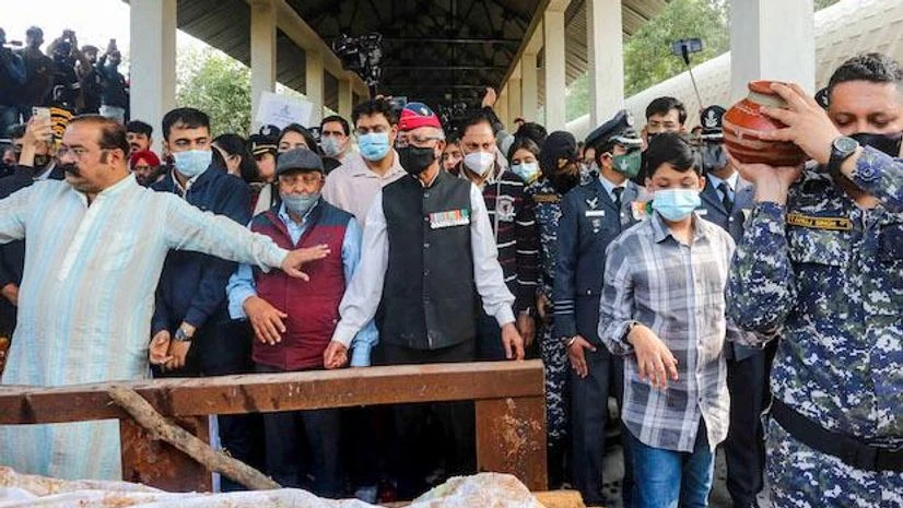 Family members perform last rites during the funeral of Group Captain Varun Singh at Sant Hirdaram Crematorium in Bhopal (Photo: PTI) Family members perform last rites during the funeral of Group Captain Varun Singh at Sant Hirdaram Crematorium in Bhopal (Photo: PTI)