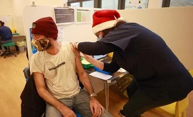 Surging Covid cases make for another subdued Christmas Day England