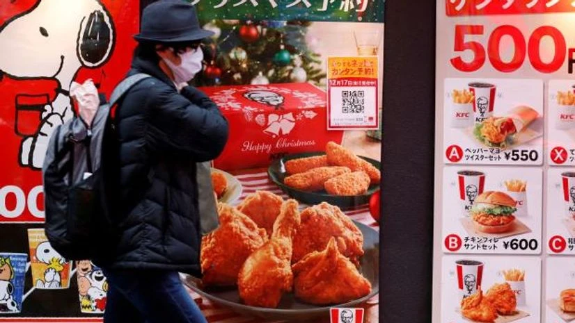 tokyo A man wearing a protective mask, amid the coronavirus disease outbreak, walks past a Kentucky Fried Chicken (KFC) restaurant in Tokyo (Photo: Reuters)