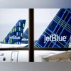 S&P, Moody's downgrade JetBlue amid $3 bn debt raise, shares sink JetBlue Airways
