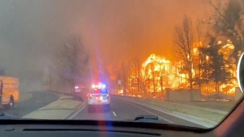 Footage of fires burning is seen from a Broomfield Police Department patrol car in Superior, Colorado Footage of fires burning is seen from a Broomfield Police Department patrol car in Superior, Colorado