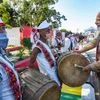 Prime Minister Narendra Modi plays a drum during his visit to Manipur