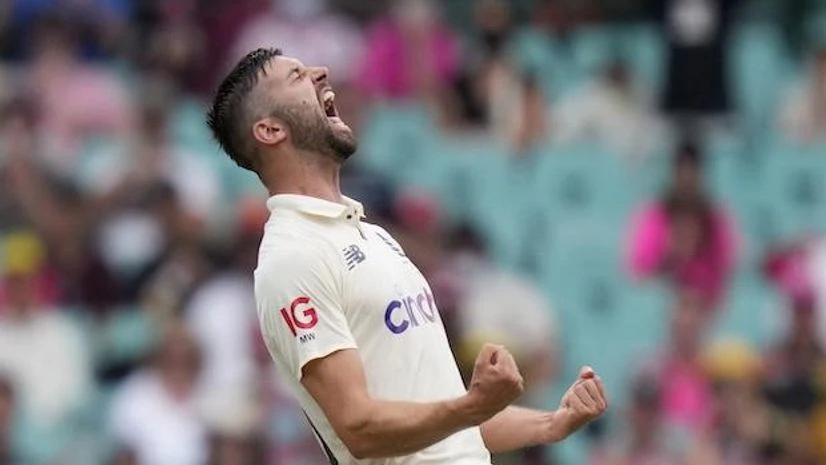 England's Mark Wood celebrates taking the wicket of Australia's Marnus Labuschagne during their Ashes cricket test match in Sydney (Photo: AP/PTI) England's Mark Wood celebrates taking the wicket of Australia's Marnus Labuschagne during their Ashes cricket test match in Sydney (Photo: AP/PTI)