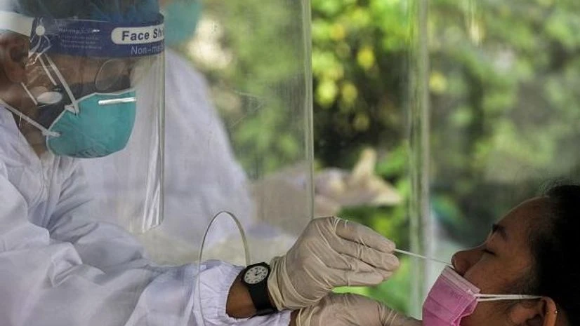 Philippines covid A member of the public gets her nose swabbed for a Covid-19 antigen test in Quezon City, the Philippines, on Thursday, Jan. 6, 2022. (Photo: Bloomberg)
