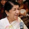 This file photo dated November 25, 2013 shows Lata Mangeshkar speaking at an event hosted by her family in Mumbai. The singer is being treated at Mumbai's Breach Candy Hospital. (PTI photo)