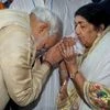 File Image: Nov. 1, 2013, of then Gujarat Chief Minister Narendra Modi with legendary singer Lata Mangeshkar during the inauguration of Dinanath Mangeshkar Superspeciality Hospital, in Pune.