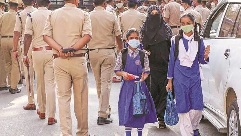 hijab Karnataka govt set to crack down on outfits disturbing peace