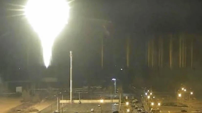 Ukraine, Zaporizhzhia nuclear power plant This image made from a video released by Zaporizhzhia nuclear power plant shows bright flaring object landing in grounds of the nuclear plant in Enerhodar, Ukraine (Photo: AP/PTI)