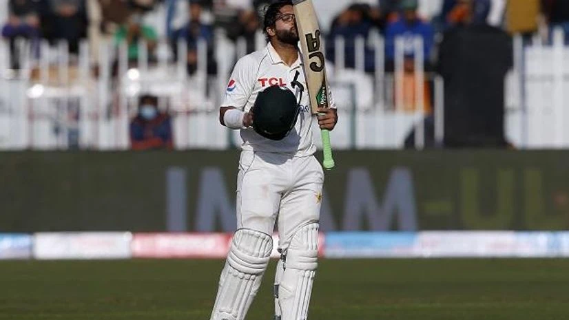 Imam-ul-Haq Pakistan's Imam-ul-Haq kisses his bat after completing a century during the 1st day of first cricket test match between Pakistan and Australia at the Pindi Stadium in Rawalpindi (Photo: AP/PTI)