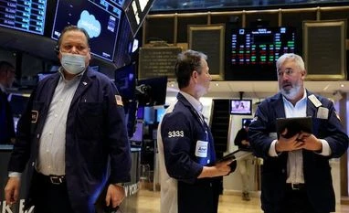 Wall Street rises as rate hike fears ebb; GameStop gains on stock split NYSE