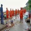 NDRF and police personnel at low lying areas of fishermen village, ahead of the landfall of Cyclone Asani, in Andaman and Nicobar Islands