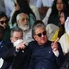 Pakistan's Foreign Minister Shah Mahmood Qureshi and Chinese Foreign Minister Wang Yi, gesture as they attend Pakistan Day military parade in Islamabad (Photo: Reuters)