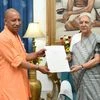 Uttar Pradesh CM-designate Yogi Adityanath with governor Anandiben Patel
