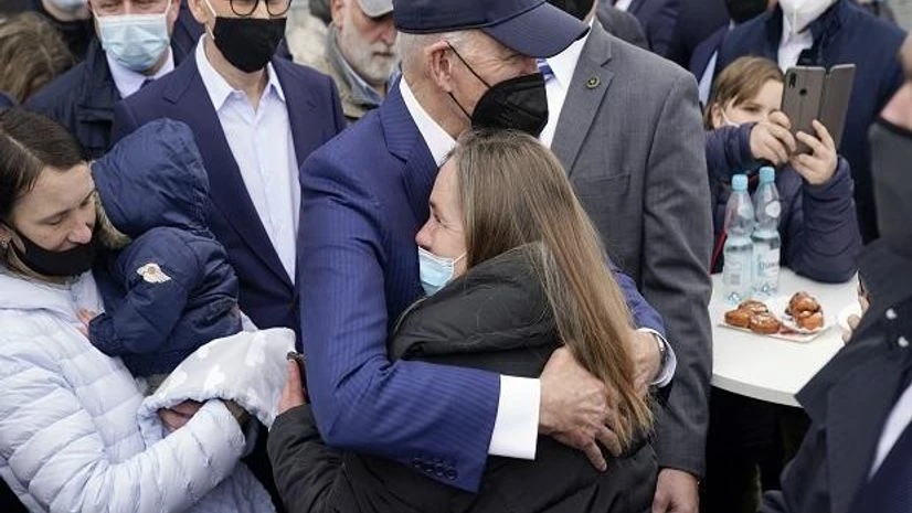President Joe Biden meets with Ukrainian refugees and humanitarian aid workers during a visit to PGE Narodowy Stadium, in Warsaw (Photo: AP/PTI) President Joe Biden meets with Ukrainian refugees and humanitarian aid workers during a visit to PGE Narodowy Stadium, in Warsaw (Photo: AP/PTI)