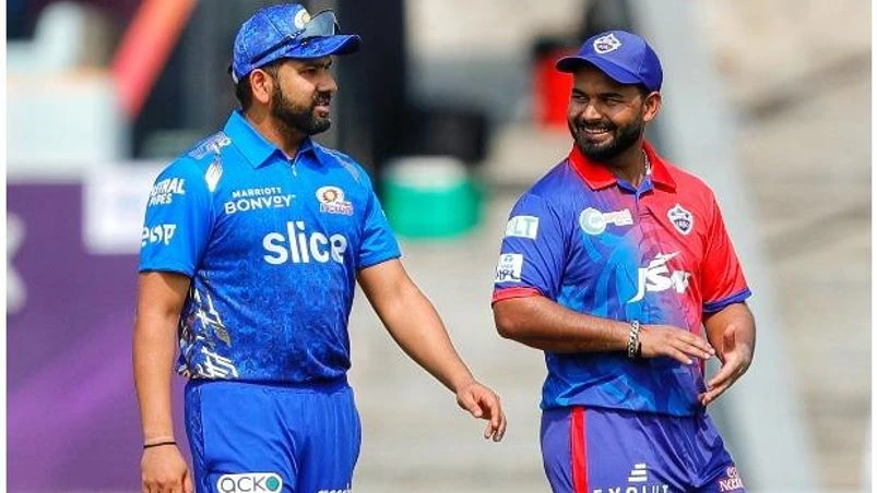 IPL MI vs DC Mumbai Indians captain Rohit Sharma with Delhi Capitals captain Rishabh Pant during toss in IPL 2022. Photo:@DelhiCapitals