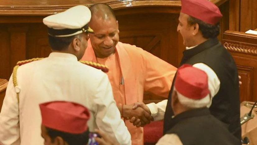 Uttar Pradesh Chief Minister Yogi Adityanath and Leader of Opposition Akhilesh Yadav Uttar Pradesh Chief Minister Yogi Adityanath and Leader of Opposition Akhilesh Yadav exchange greetings after taking oath as Members of the Legislative Assembly, in Lucknow (Photo: PTI)