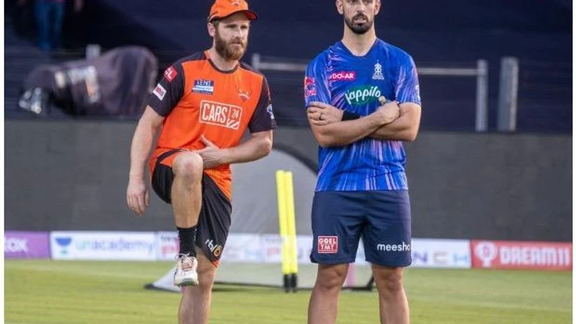 RR vs SRH IPL 2022 SRH's Kane Williamson alongside RR's Daryl Mitchell at MCA Stadium, Pune. Photo:@SunRisers