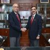 Newly appointed Managing Director of Delhi Metro Rail Corporation (DMRC) Vikas Kumar (R) with outgoing Managing Director of DMRC Mangu Singh, in New Delhi
