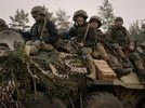 Destroyed Russian armored vehicles are seen in the outskirts of Kyiv, Ukraine, Thursday, March 31, 2022. (AP Photo/Rodrigo Abd)