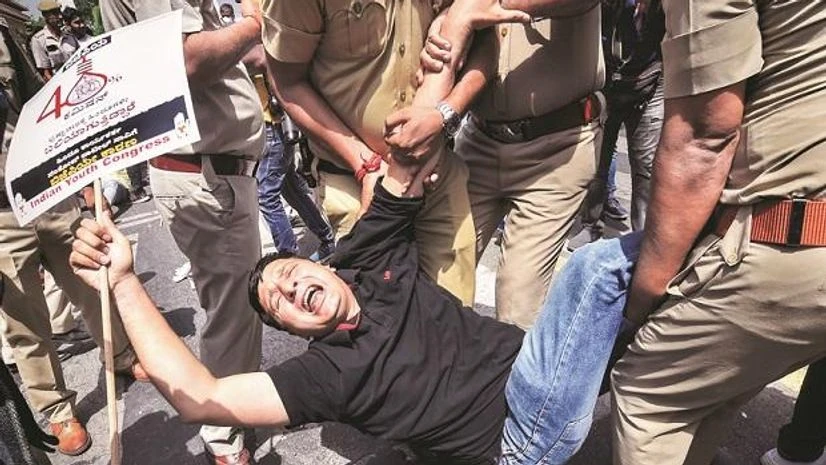 Karnataka contractor death Police detain a member of Indian Youth Congress during a protest near Union Home Minister Amit Shah's residence, demanding the resignation and arrest of Karnataka Minister KS Eshwarappa over the death of contractor Santosh Patil | Photo: PTI