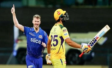 MI send CSK out of reckoning for IPL play-offs with five-wicket win Riley Meredith of Mumbai Indians celebrates the wicket of Shivam Dube of Chennai Super Kings