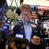 Wall Street surges over 1.5% on upbeat forecasts from retailers, Fed relief