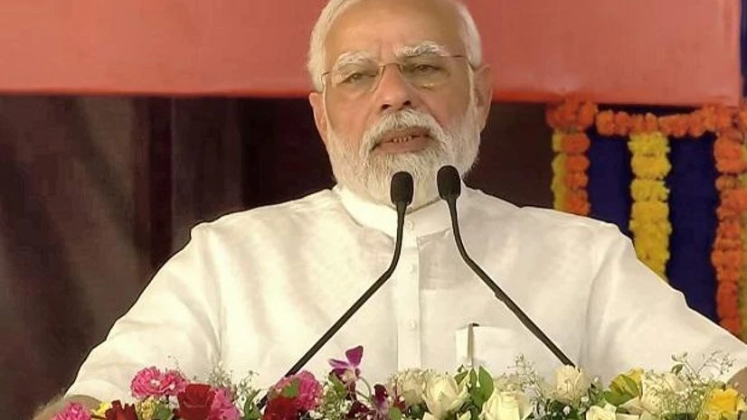 Narendra Modi PM Narendra Modi addresses a gathering after inaugurating a 200-bed multi-specialty hospital at Atkot town in Gujarat's Rajkot district. (PTI Photo)