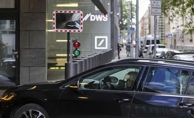 Deutsche Bank subsidiary DWS CEO resigns after greenwashing raid DWS