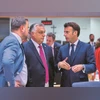Hungary's PM Viktor Orban (centre) & French Prez Emmanuel Macron (right) at the EU Summit in Brussels | Photo: Reuters Hungary's PM Viktor Orban (centre) & French Prez Emmanuel Macron (right) at the EU Summit in Brussels | Photo: Reuters