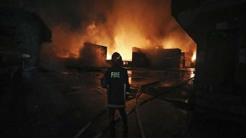 Bangladesh fire Firefighters work to contain a fire that broke out at the BM Inland Container Depot, a Dutch-Bangladesh joint venture, in Chittagong. (AP Photo)
