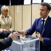 French President Emmanuel Macron casts his vote in the first round of French parliamentary elections, at a polling station in Le Touquet