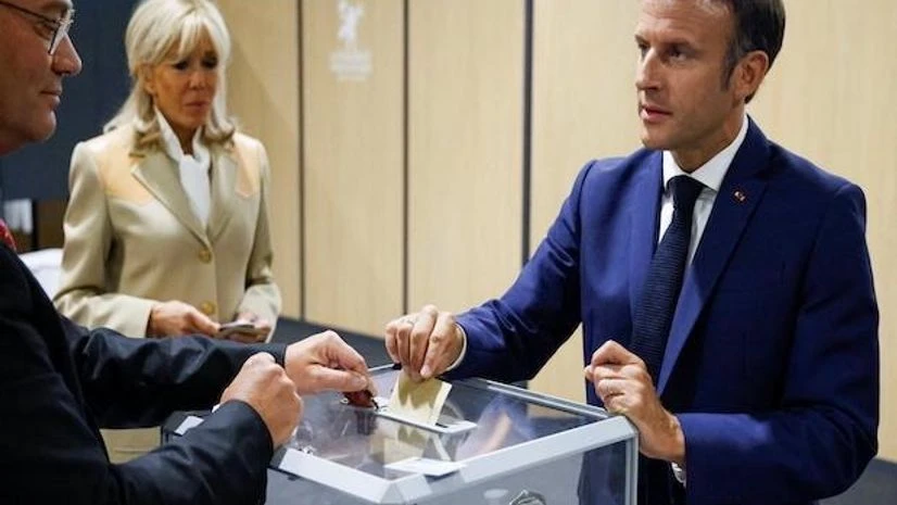 French President Emmanuel Macron casts his vote in the first round of French parliamentary elections, at a polling station in Le Touquet French President Emmanuel Macron casts his vote in the first round of French parliamentary elections, at a polling station in Le Touquet