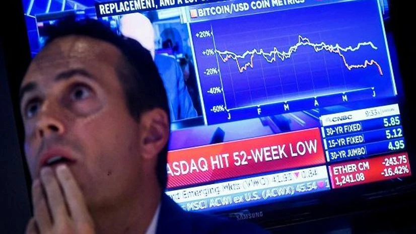 US stocks, Wall street, US markets, NYSE A trader works on the floor of the New York Stock Exchange (NYSE) in New York City (Photo: Reuters)