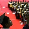 Increasingly, new college graduates are hoping that the government can provide their first jobs and state-owned enterprises are the most highly desired placements. (Photo: Bloomberg)