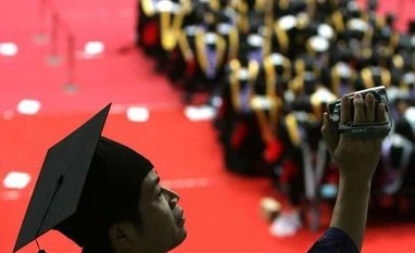 Amid record high unemployment, can China employ all of its graduates? China graduate