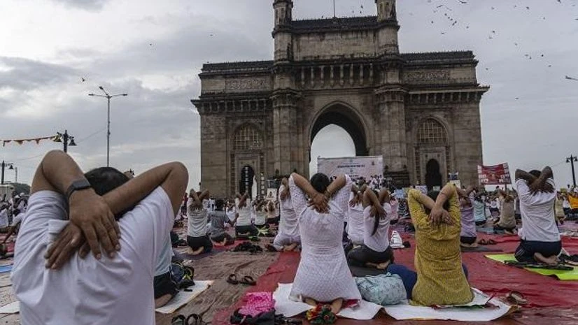 Yoga day, Gateway of India People perform Yoga to mark International Day of Yoga at the Gateway of India in Mumbai, India, Tuesday, June 21, 2022. Yoga enthusiasts across the world Tuesday took part in mass yoga events to mark Yoga Day. Photo: AP