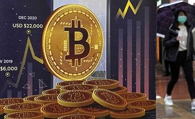 Bitcoin touches lowest level since December 2020 after Fed's 75 bps hike Bitcoin, cryptocurrency
