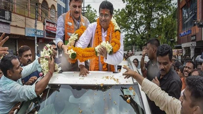 Tripura, Manik Saha Tripura Chief Minister & BJP candidate Manik Saha with supporters at a road show after winning from Town Bardowali seat, during Tripura Assembly by-elections, in Agartala (Photo: PTI)