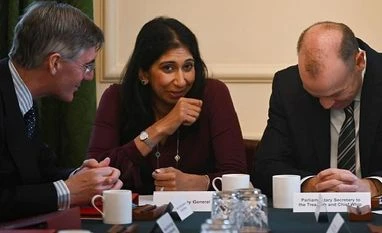 Suella Braverman may be only Indian-origin MP in new Truss-led UK Cabinet British Minister for Brexit Opportunities and Government Efficiency Jacob Rees-Mogg, British Attorney General Suella Braverman and British Parliamentary Secretary to the Treasury Chris Heaton-Harris share a laugh during a cabinet meeting in Downing S