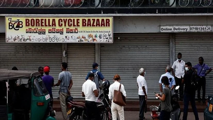 Sri Lanka, Fuel crisis Customers wait outside a cycle shop to buy brand new cycles due to major fuel shortage, amid the country's economic crisis, in Colombo, Sri Lanka, July 6, 2022. (REUTERS)