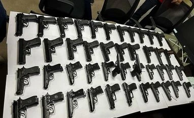 Married couple held for smuggling 45 hand guns at Delhi airport: Customs Guns