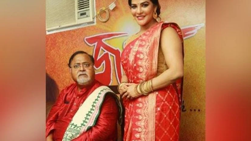 Arpita Mukherjee with West Bengal Commerce and Industry Minister Partha Chatterjee Arpita Mukherjee with West Bengal Commerce and Industry Minister Partha Chatterjee