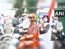 Union Minister Smriti Irani on her scooty at the bike rally in Delhi Union Minister Smriti Irani on her scooty at the bike rally in Delhi