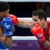 Birmingham: India's Mohammad Hussamuddin in action against Namibia's Tryagain Morning during the men's  54kg - 57kg category boxing quarter-final match of the Commonwealth Games 2022 (CWG), in Birmingham, UK, Wednesday, Aug. 3, 2022. (PTI Photo/Swapa