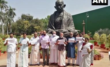 Not being allowed to raise issue, claim DMK MPs as they walk out of LS Representative Image of DMK MPs protesting in Parliament