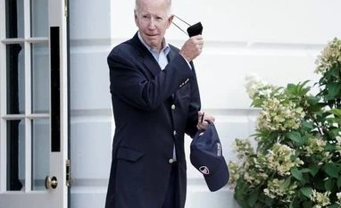 US has concerns about any country exercising with Russia: Official US President Joe Biden takes off his mask as he walks towards Marine One for departure to Rehoboth Beach, Delaware from the South Lawn of the White House in Washington, DC (Photo: Reuters)