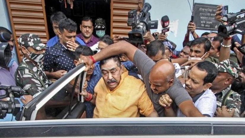 Trinamool Congress leader Anubrata Mondal Trinamool Congress leader Anubrata Mondal after his arrest by the CBI in connection with a cattle smuggling case, at Bolpur in Birbhum district of West Bengal (Photo: PTI)
